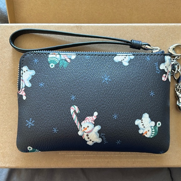 Coach snowman corner zip wristlet with 2 charms! Snowman and Charms Boxed set. - Picture 2 of 11